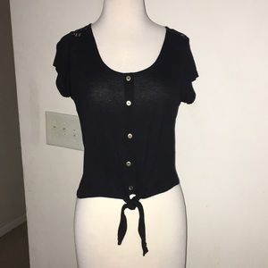 Black button up top with a string for tying a bow